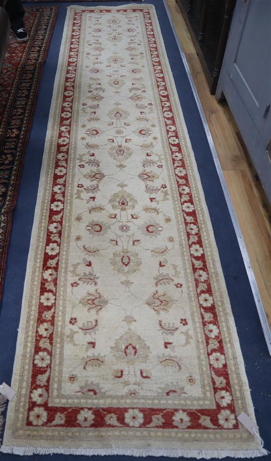 A Ziegler style cream ground runner Approx. 370 x 90cm